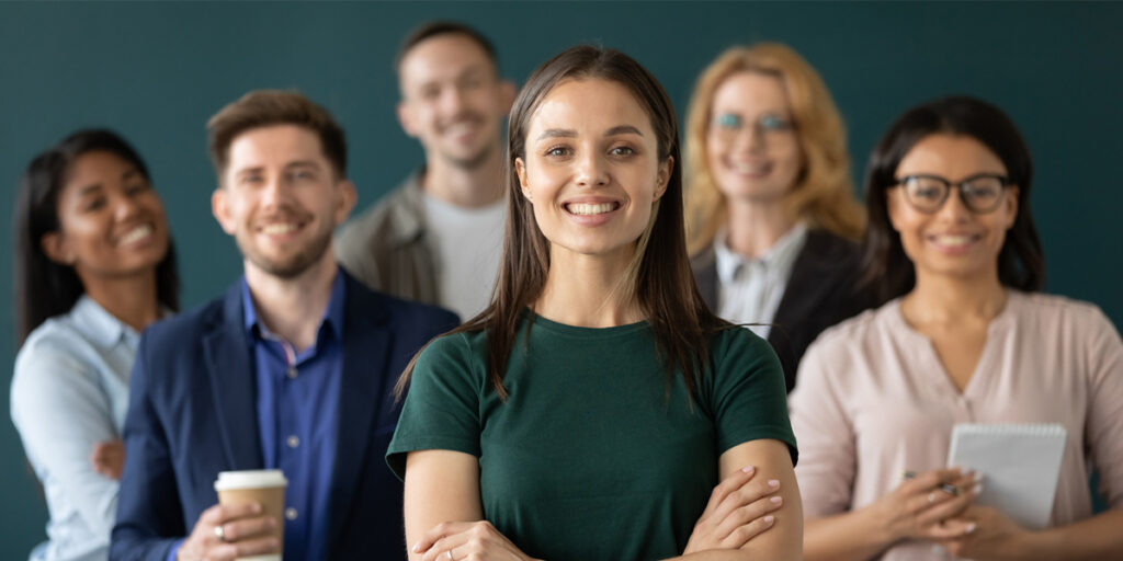 group of employees posing for camera