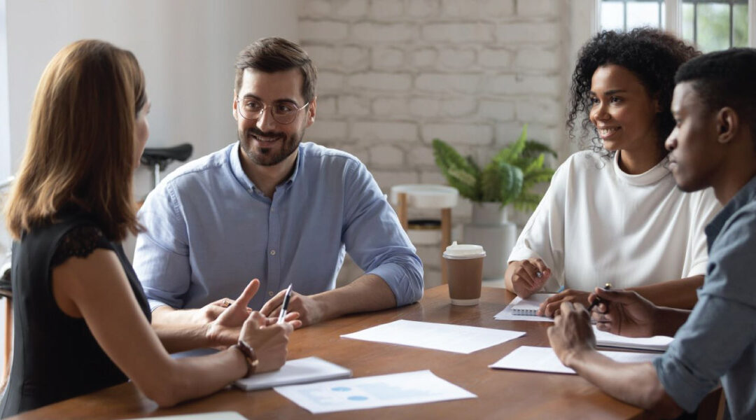 employees discussing types of retirement plans