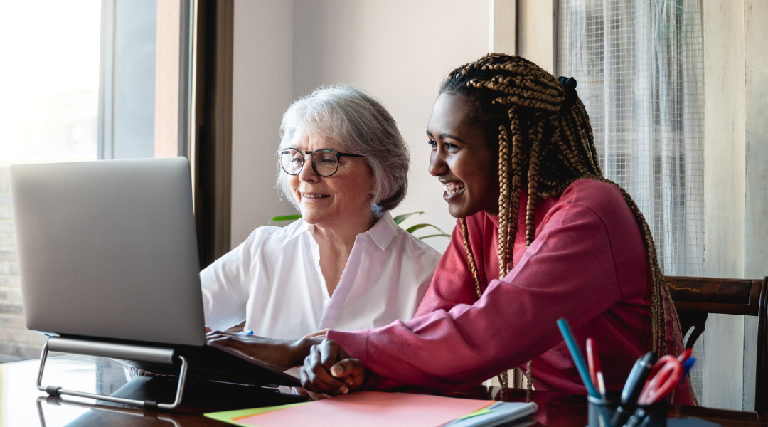 TPA and employer discussing ERISA Section 404(c) over laptop