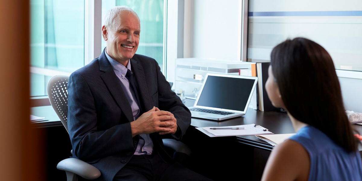 Business man meeting with woman in office