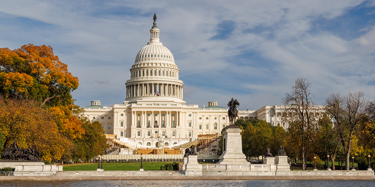 The US Capitol in Washington DC surrounded by vibrant autumn foliage