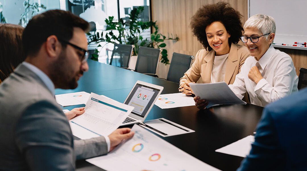 Business colleagues in conference meeting room during presentation